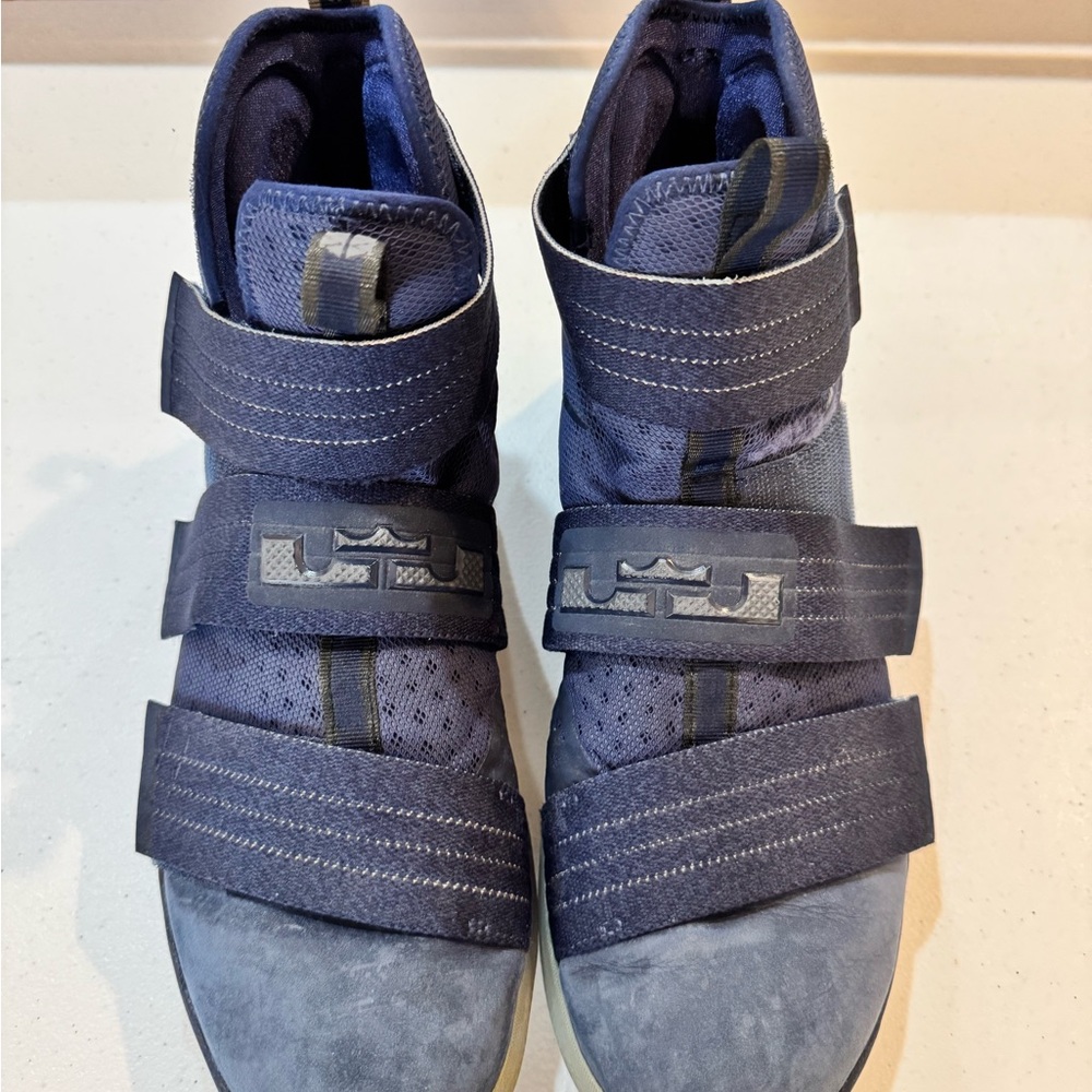 Nike LeBron Basketball Shoes with Velcro Straps and Navy Blue Suede Finish.